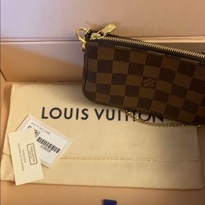 Mini pochette new with tags